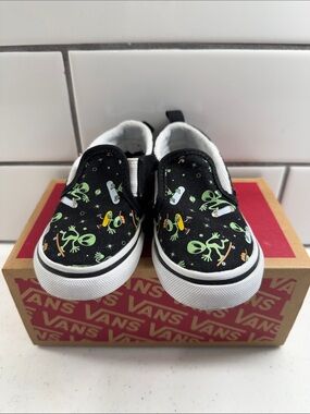 Vans Kids Black Slip-On Sneakers with Green Alien & Orange Accents